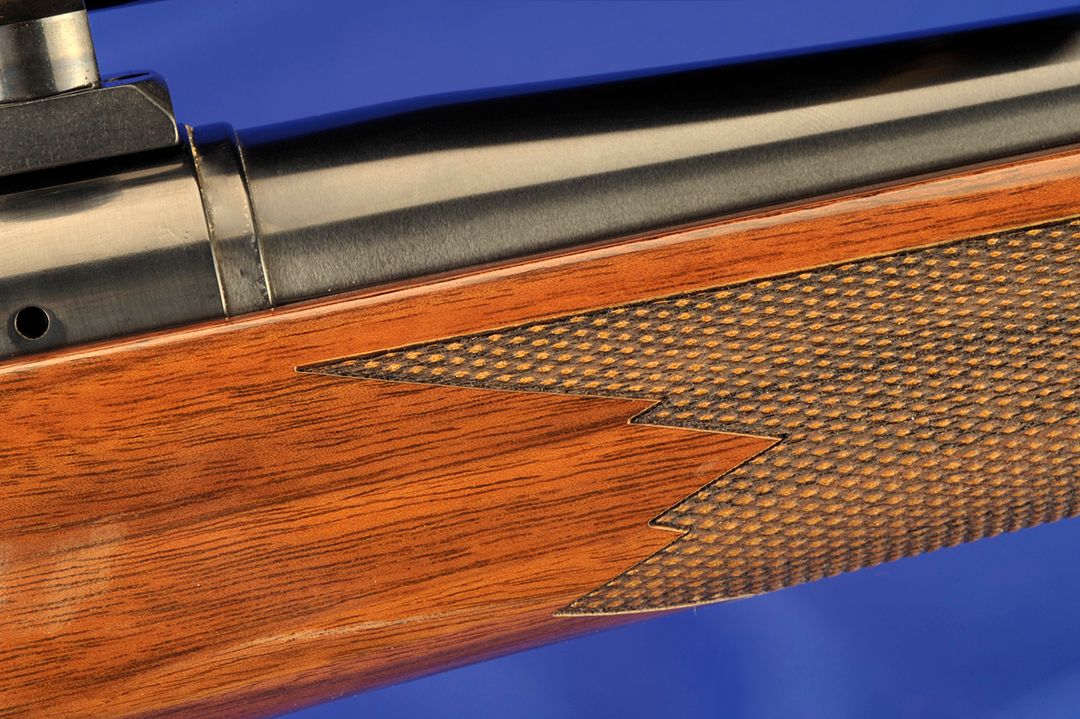 It’s the details that make a rifle perfect. Close inletting, crisp checkering and a fine finish make a hunter proud to carry this gun in the woods.